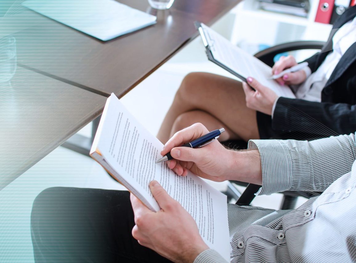 Business people taking notes; panoramic banner